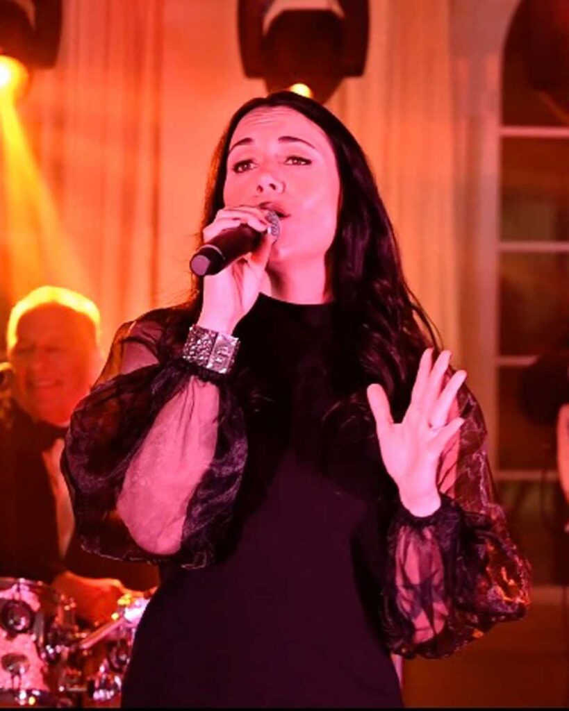 American Idol semi-finalist Nicole Tranquillo from the Sid Miller Dance Band.